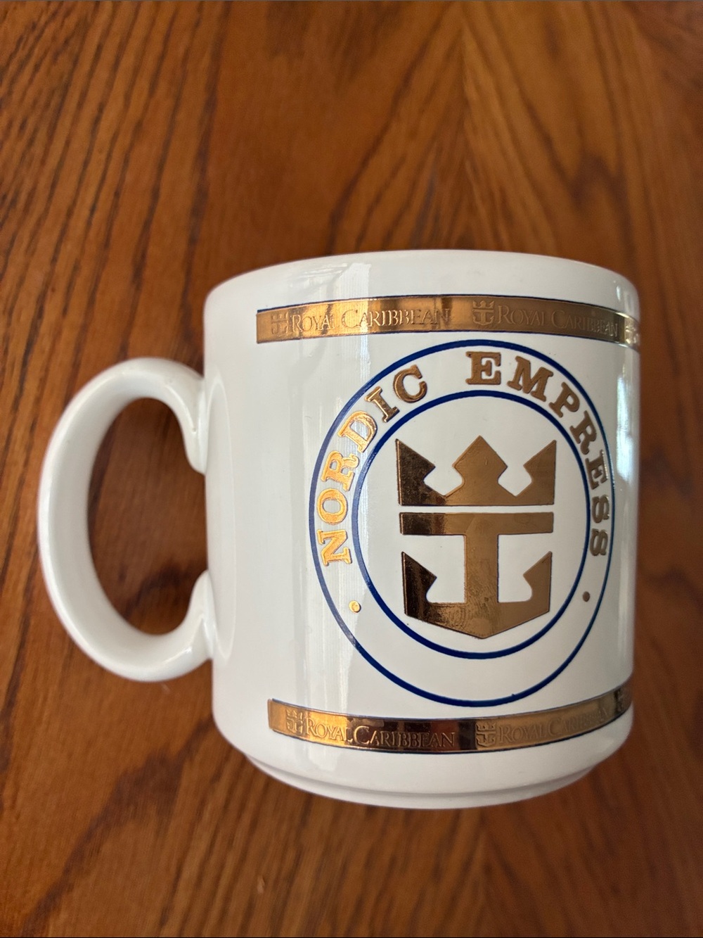 Royal Caribbean White Ceramic Mug with Gold and Blue Nordic Empress Crest